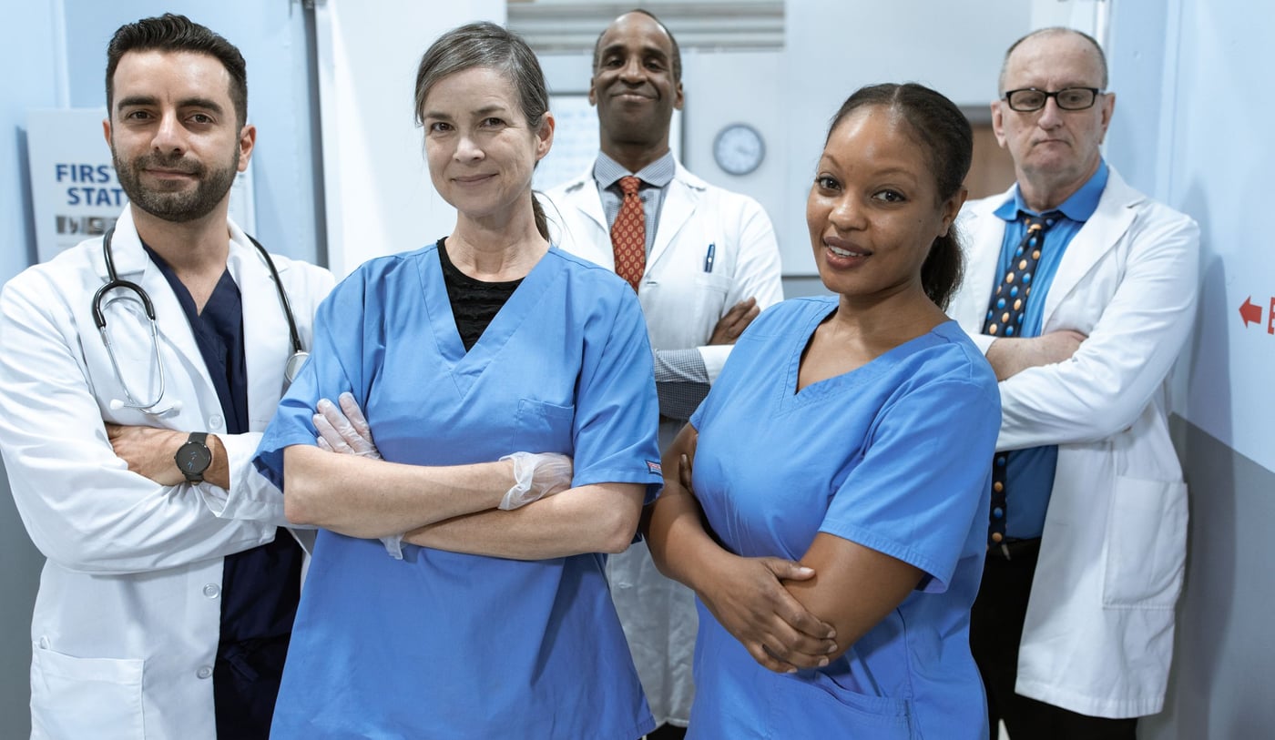 A dental team standing together in their office.